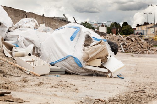 Professional workers conducting house clearance in Highbury